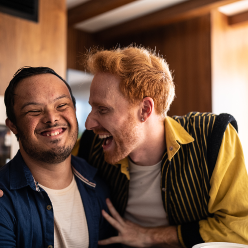 Nightingale staff management page image of a happy red haired carer interacting with his NDIS participant