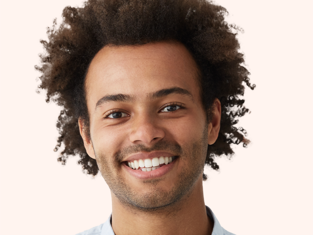 Nightingale billing and claims software atf image with a young man smiling at the screen